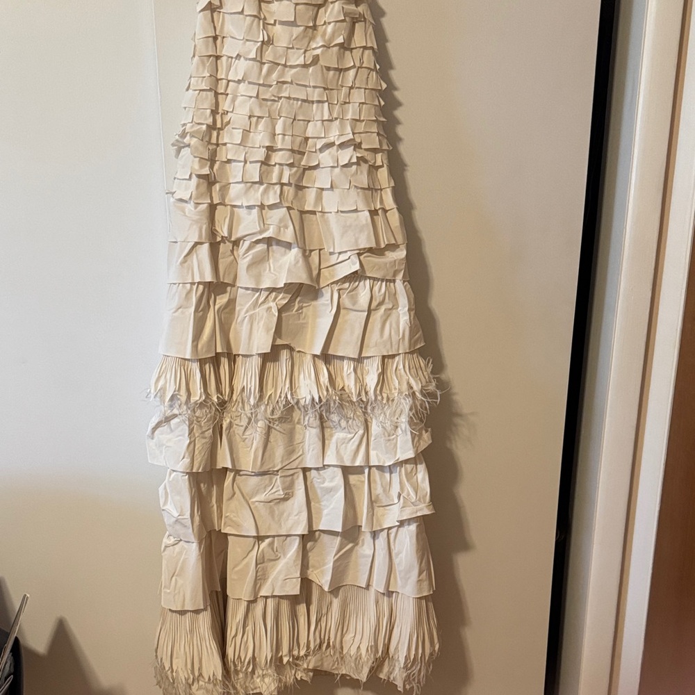 Elegant Cream Ruffled tiered formal evening gown with feathers